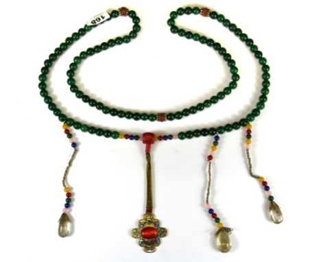 A large strand of Tibetan green jade/hardstone prayer beads, folded L. 89cm.