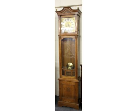 An Edwardian oak longcase clock with chiming movement, H. 193cm, (understood to be w/o).