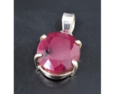 RUBY SINGLE STONE PENDANTthe oval cut ruby approximately 18cts, in silver mount, approximately 3cm high including suspension 