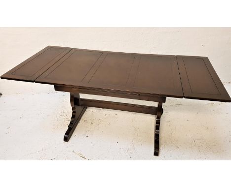 ERCOL DRAWLEAF DINING TABLEwith an oblong panelled top, standing on shaped end supports united by a stretcher, 175cm extended