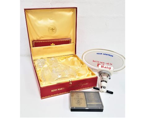 BACCARAT CRYSTAL REMEY MARTIN DECANTERwith a fleur de lis stopper, contained in a fitted leather box with the history of Remy