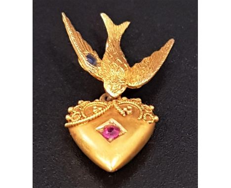 FIFTEEN CARAT GOLD RUBY AND SAPPHIRE SET PENDANTthe ruby set heart suspended from a sapphire set bird, approximately 2.4cm hi