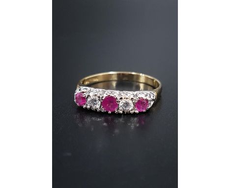 GRADUATED RUBY AND DIAMOND FIVE STONE RINGthe rubies totaling approximately 0.35cts and diamonds approximately 0.2cts, on eig