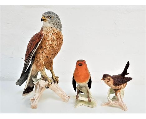 THREE GOEBEL BIRD ORNAMENTScomprising a Kestrel, impressed mark CV 110 and 1969, 23.2cm high; a Robin, impressed CV 100, 12.5
