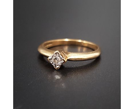 DIAMOND SOLITAIRE RING the illusion set diamond approximately 0.05cts, on nine carat gold shank, ring size J-K 