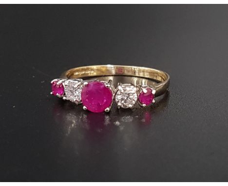 GRADUATED RUBY AND DIAMOND FIVE STONE RINGthe central round cut ruby approximately 0.5cts and the diamonds totaling approxima