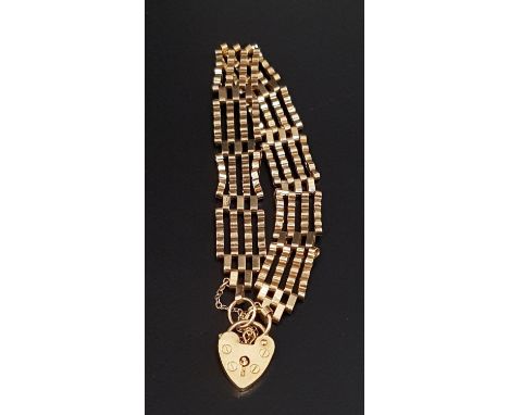 NINE CARAT GOLD GATE BRACELETwith nine carat gold padlock clasp and safety chain, approximately 8.6 grams 