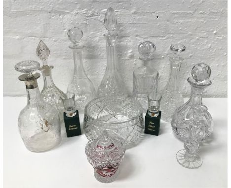 SELECTION OF CRYSTAL AND GLASS DECANTERS AND BOWLSincluding a Wedgwood decanter and stopper; a floral etched glass decanter w