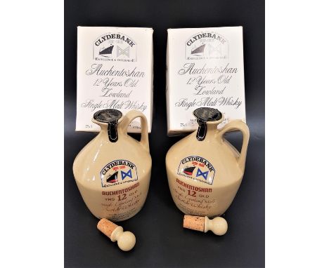 TWO DECANTERS OF AUCHENTOSHAN CLYDEBANK CENTENARY 12 YEARS OLD Single Malt Scotch Whisky. 75cl. 43% abv. In ceramic decanters