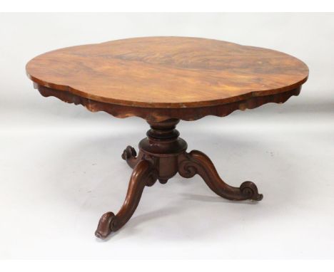 A VICTORIAN FIGURED MAHOGANY SHAPED TOP TABLE, on centre pillar ending in three curving legs. 4ft 5ins long x 3ft 7ins wide.