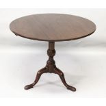 A GEORGE III MAHOGANY CIRCULAR TOP TRIPOD TABLE with bird cage support and pad feet. 2ft 10ins