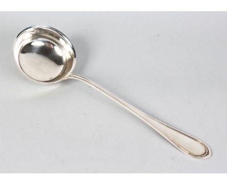 A .800 CONTINENTAL SILVER SOUP LADLE.