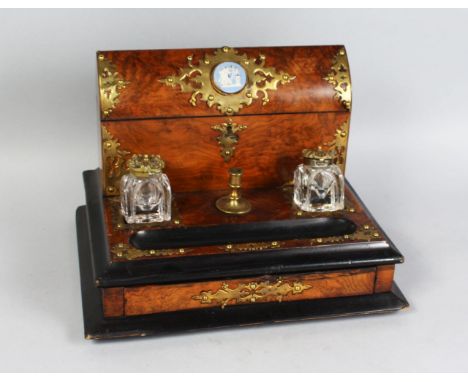 A GOOD VICTORIAN BRASS BOUND WALNUT STATIONERY WRITING BOX, the domed rising top inset with a jasper plaque, the base with tw
