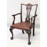 A 19TH CENTURY CHIPPENDALE STYLE MAHOGANY ARMCHAIR, with pierced vase splat, curving arms, drop-in