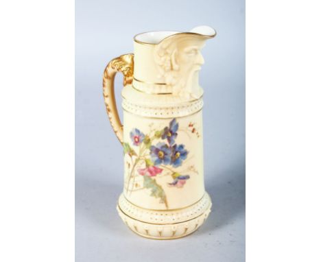 A ROYAL WORCESTER BLUSH IVORY JUG with bearded mask spout painted with flowers in the style of Raby, date code for 1894.