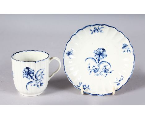 AN 18TH CENTURY WORCESTER COFFEE CUP AND SAUCER printed in under-glaze blue with the Gillyflower pattern.