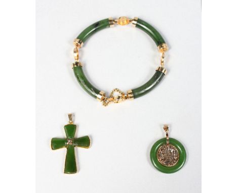 A CHINESE JADE AND GOLD BRACELET with two pendants.
