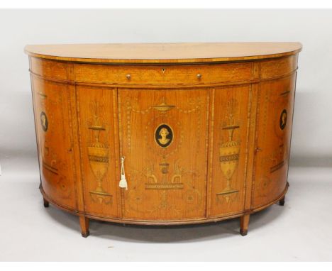 A SUPERB LARGE GEROGE III SHERATON DESIGN SATINWOOD INLAID COMMODE, one drawer above three doors, inlaid with Greek motifs, s