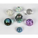SEVEN VARIOUS GLASS PAPERWEIGHTS.