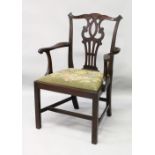 A 19TH CENTURY CHIPPENDALE STYLE MAHOGANY ARMCHAIR, with pierced vase splat, curving arms, drop-in