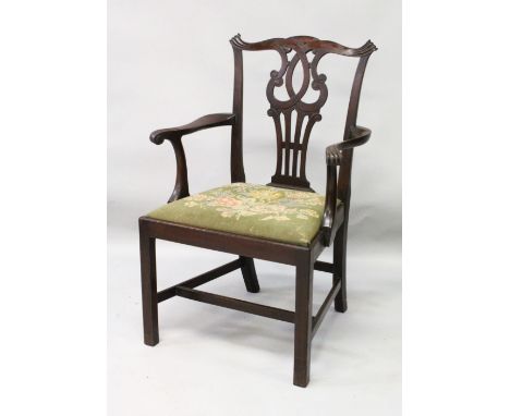 A 19TH CENTURY CHIPPENDALE STYLE MAHOGANY ARMCHAIR, with pierced vase splat, curving arms, drop-in seat, supported on square 