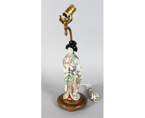 A JAPANESE PORCELAIN FIGURE OF A GEISHA, converted to a lamp.