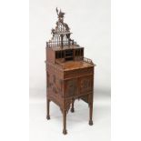 A CHINESE CHIPPENDALE REVIVAL SIDE CABINET, 20TH CENTURY, with ho-ho bird cresting, pierced back,
