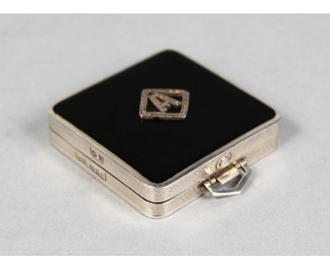 A SILVER AND ENAMEL SQUARE COMPACT, Initial A.