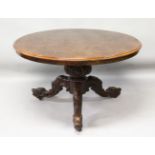 A GOOD VICTORIAN FIGURED WALNUT CIRCULAR DINING TABLE, on a centre pillar ending in three curving