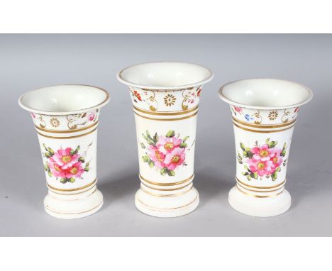 A 19TH CENTURY ENGLISH PORCELAIN GARNITURE OF SPILL VASES painted with dog roses, probably Spode.