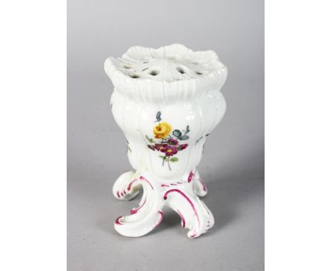 AN 18TH CENTURY MEISSEN PORCELAIN MULTI-STEM FLOWER VASE raised on four scrolling feet, painted with flowers, crossed swords 