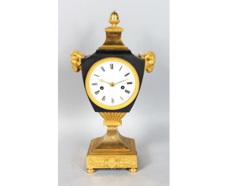 A GOOD FRENCH EMPIRE ORMOLU MANTLE CLOCK,with eight day movement striking on a bell, white enamel dial with black Roman numer