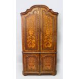 A 19TH CENTURY DUTCH WALNUT AND MARQUETRY STANDING CORNER CUPBOARD, the upper section with arched