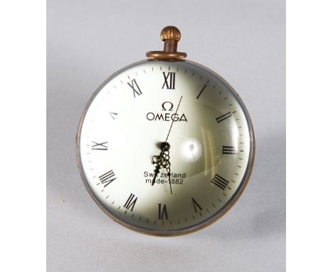 A LARGE "OMEGA" STYLE BALL CLOCK. 3ins diameter.
