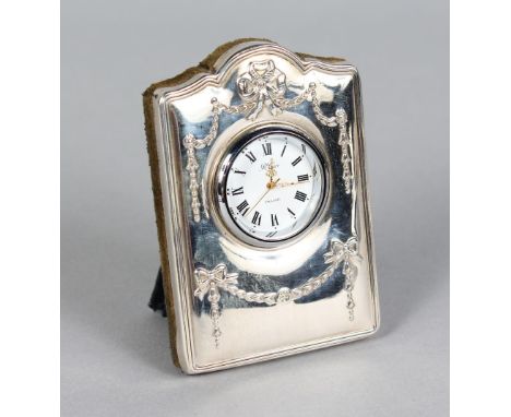 A SILVER MOUNTED EASEL CLOCK CASE AND CLOCK. 3.5ins high.