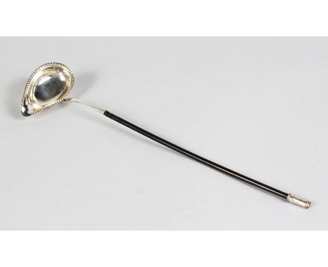 A TODDY LADLE.