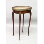 A 19TH CENTURY FRENCH KINGWOOD, ORMOLU AND MARBLE OVAL TABLE, with galleried top on curving legs.