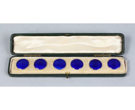 A SET OF SIX SILVER AND BLUE ENAMEL BUTTONS. Birmingham 1910,  Maker: L.E., in a leather case.