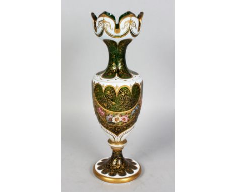 A BOHEMIAN TALL SLENDER WHITE OVERLAY, RUBY AND GILT VASE painted with garlands of flowers. 13ins high.