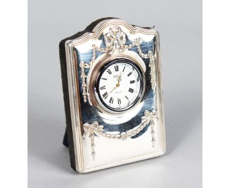 A SILVER MOUNTED EASEL CLOCK CASE AND CLOCK. 3.5ins high.