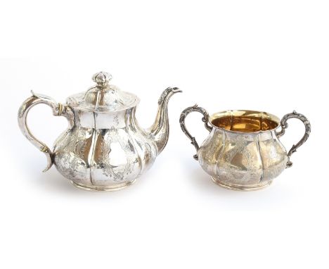 A Victorian silver teapot and sugar bowl, by Robert Hennell III, London 1849 and 1859, of shaped hexagonal form, with engrave