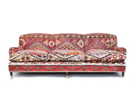 A substantial George Smith three seater sofa, upholstered with kilim, approximately 245cm wide 