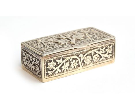 A late 19th century Middle Eastern white metal snuff box, rectangular with chased design of scrolling foliage, 6cm wide 