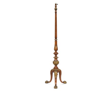 A fine mahogany and parcel gilt standard lamp, the fluted column above acanthus detail, railed on three acanthus capped cabri