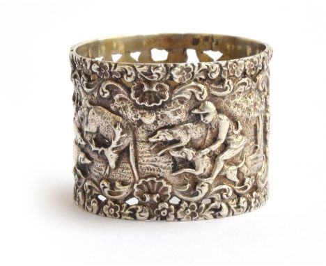 A silver napkin ring, chased with long dog hunting scenes 