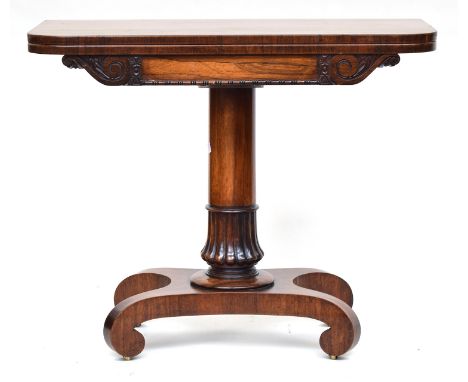 A Victorian swivel top card table, on column base and four scrolling feet, 92cm wide, 46cm deep, 76cm high 