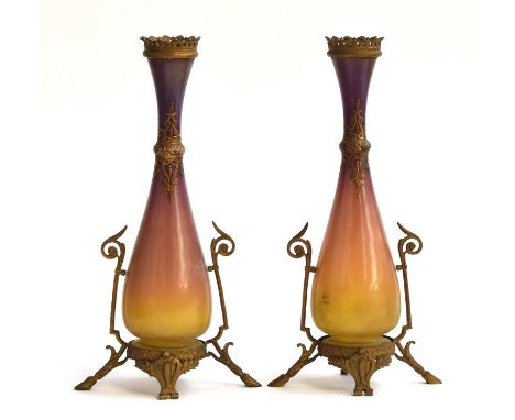 A pair of Jugendstil glass and brass vases, purple and ochre graduating glass, with scrolling enamel decoration to neck, pier