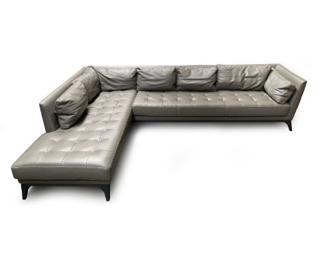 A very large Roche Bobois grey leather corner sofa, 317cm long, running 220cm outwards, each section 89cm deep