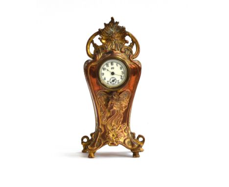 An Art Nouveau style gilt metal mantle clock by The Jennings Brothers MFG Co, Bridgeport, Conn, USA, scrolling form surmounte