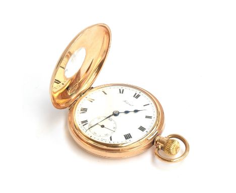A Swiss made 9ct gold half hunter pocket watch, the white enamel dial marked Federal, with Roman numerals and outer minutes t